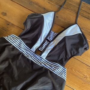 Black and white one piece, never worn!!